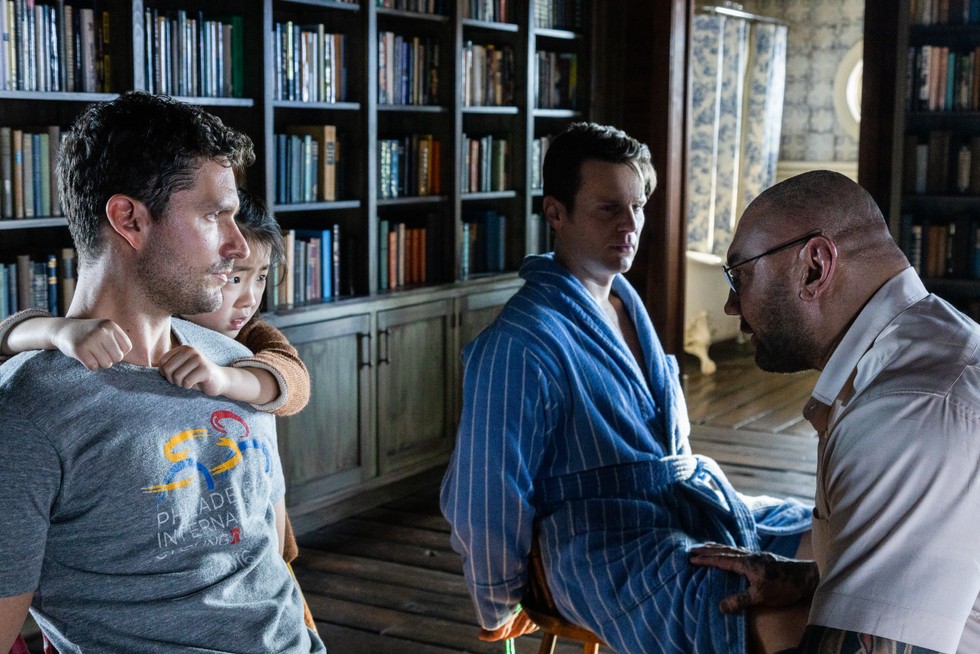 (from left) Andrew (Ben Aldridge), Wen (Kristen Cui), Eric (Jonathan Groff) and Leonard (Dave Bautista) in Knock at the Cabin, directed by M. Night Shyamalan.